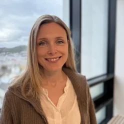 A woman smiling for the camera
